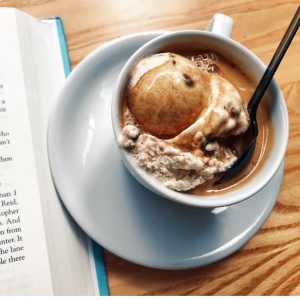 A rich affogato, with a scoop of vanilla gelato drenched in a shot of hot espresso.