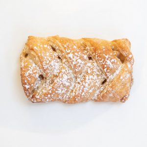 Apple Pastry, a warm and flaky pastry filled with sweet, cinnamon-spiced apples, offering a perfect balance of buttery crust and fruity filling.