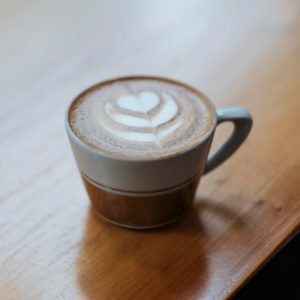 A classic cappuccino, with a perfect balance of bold espresso, steamed milk, and a frothy layer of foam.