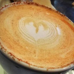 A comforting chai latte, with a warm blend of aromatic spices and smooth steamed milk.
