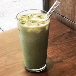 A refreshing iced matcha latte with vibrant green matcha and creamy milk.