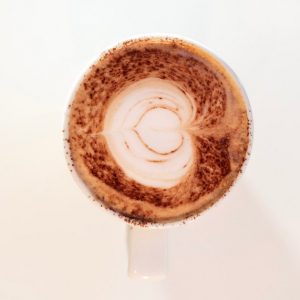 A decadent mocha, combining rich espresso, creamy milk, and a luscious layer of chocolate.