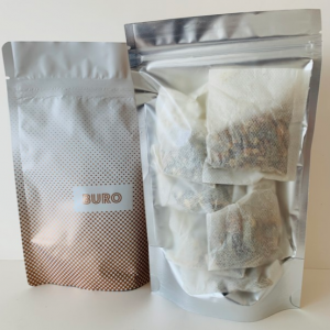 Rooibos Earl Grey tea, a fragrant blend of smooth rooibos with the bold, citrusy notes of Earl Grey, offering a caffeine-free, aromatic experience.
