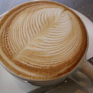 A freshly prepared Spanish Latte, featuring a perfect balance of bold espresso and velvety steamed milk, sweetened with condensed milk for a deliciously smooth taste.