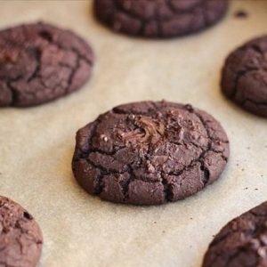 Vegan Dark Chocolate Cookie, a rich, decadent treat made with dark chocolate chips, offering a perfect balance of sweet and slightly bitter flavors, without any dairy or eggs.