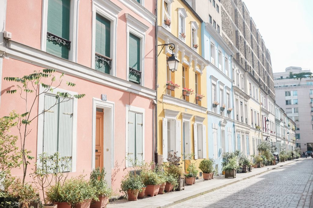 A row of pastel-colored buildings in Paris